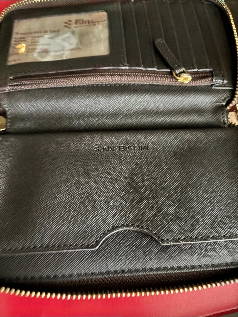 Michael Kors Black and Gold Logo Wristlet